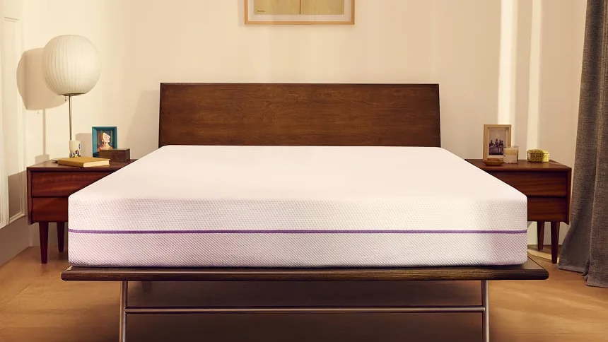 Purple Mattress on a walnut platform bed