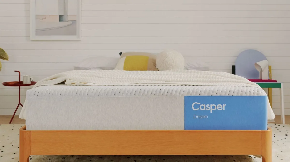 Casper Dream mattress on a wood bed frame