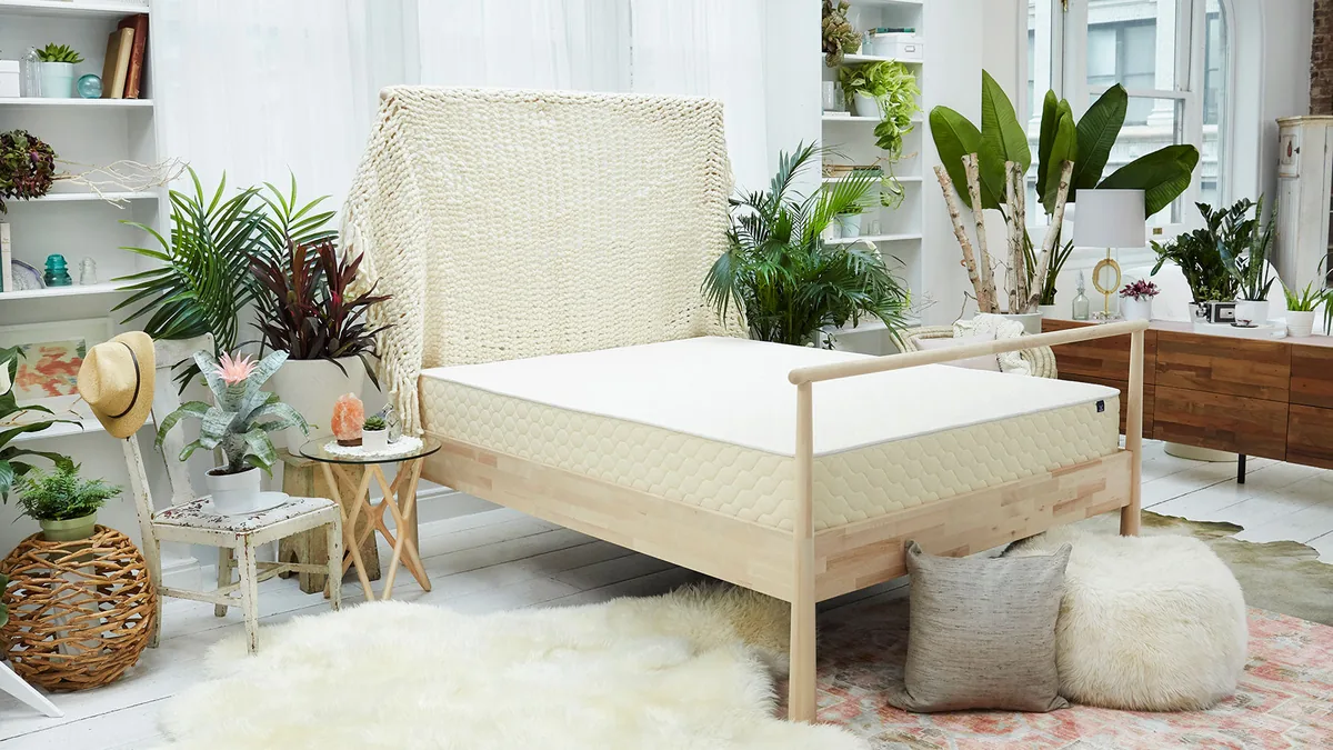 WinkBeds EcoCloud mattress on a wooden bed frame