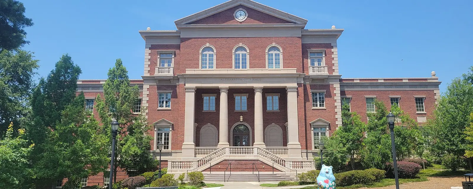 Alpharetta City Hall, a red brick building with white columns