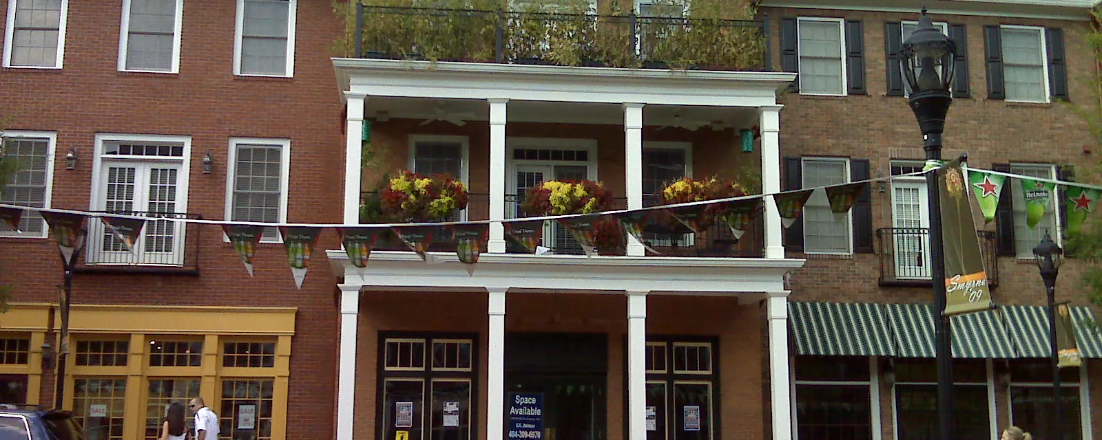Brick shops with balconies at Market Village in Smyrna, Georgia