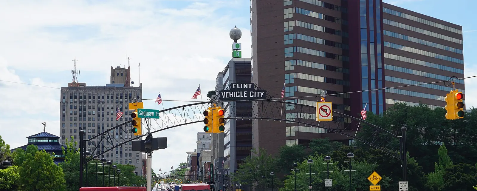 Saginaw Street in downtown Flint under the Vehicle City arch