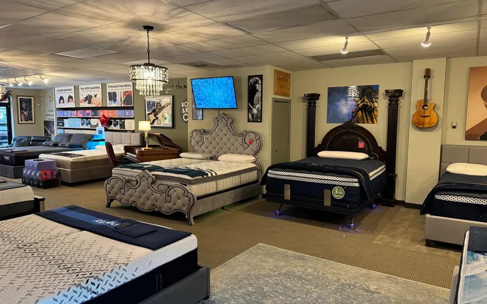 Beds on display inside Rock and Roll City Mattress Company