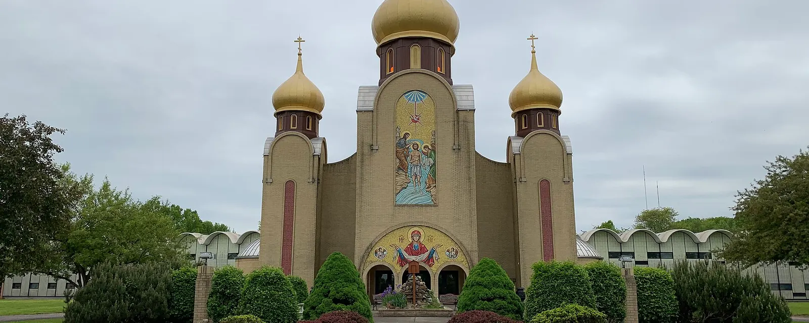 A cathedral with gold domes in Parma