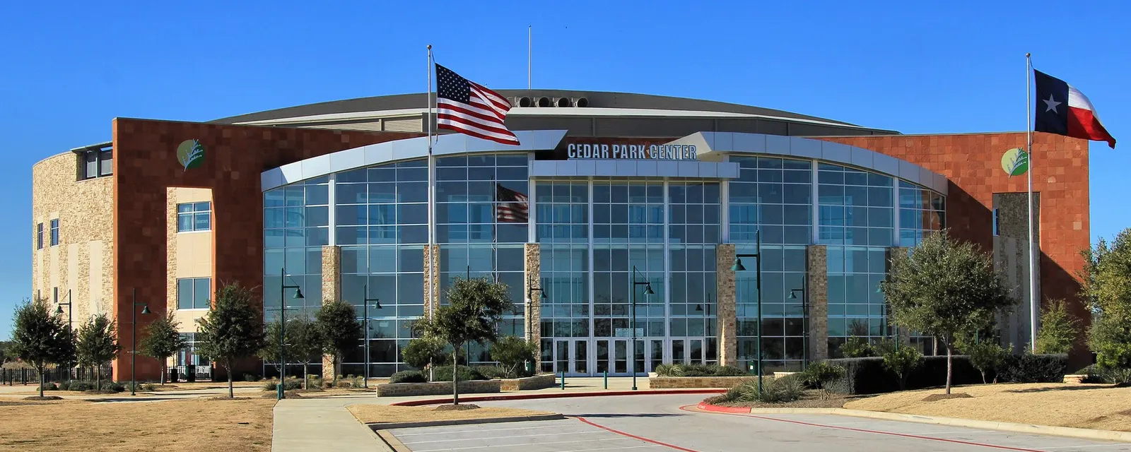 The Cedar Park Center arena under a blue sky