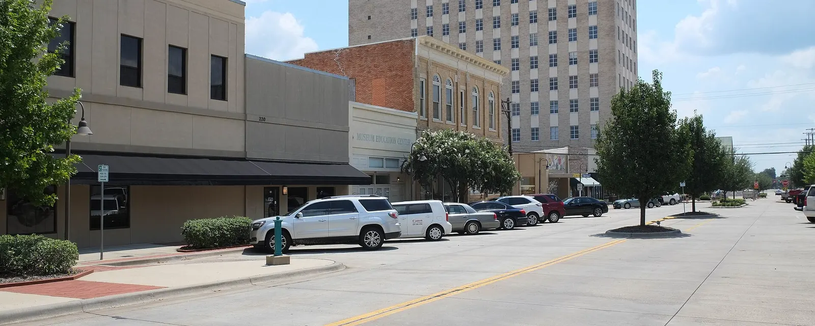 Storefronts and the Citizens National Bank tower in downtown Longview